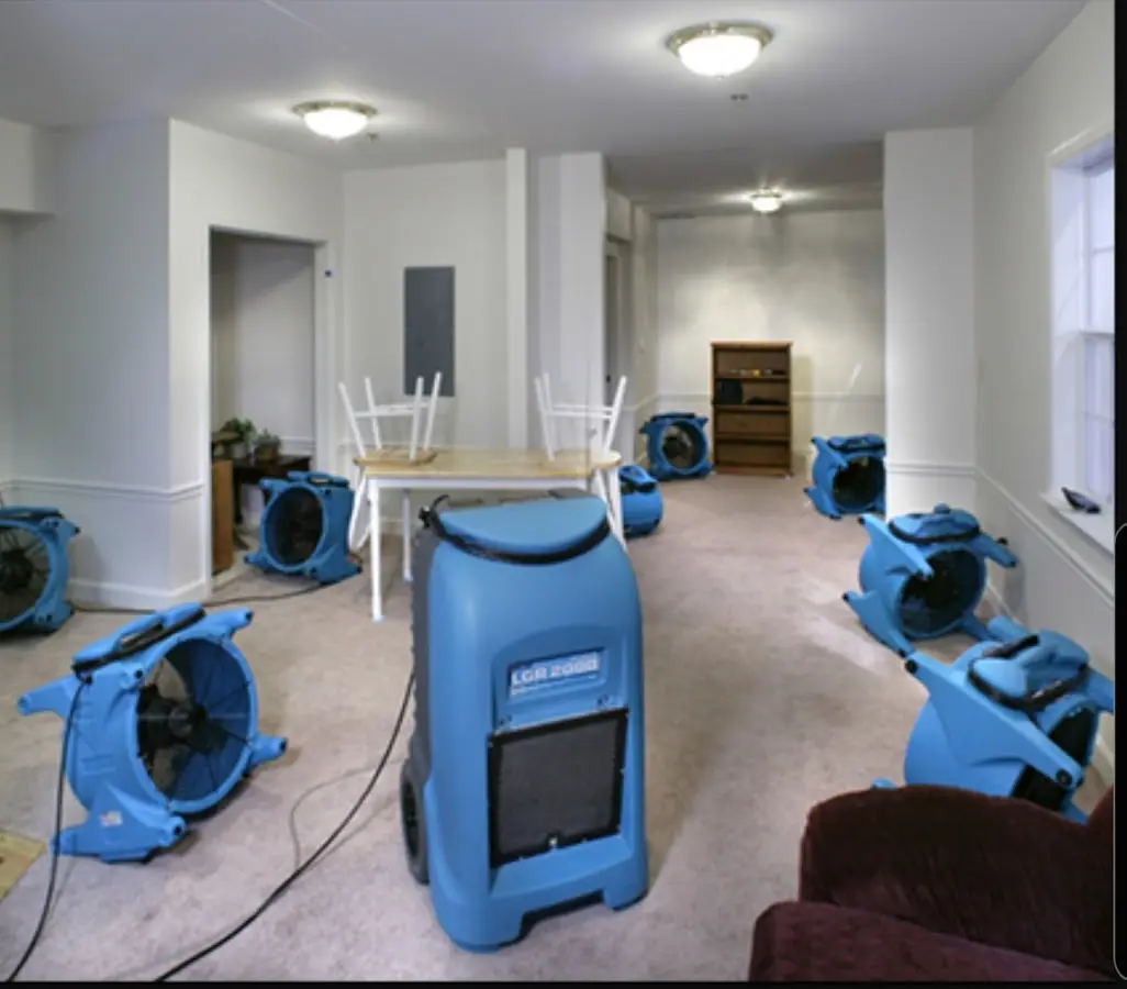 Air movers and dehumidifier setup for Water Damage Restoration in Catalina